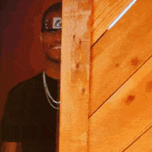 a man wearing a headband with a naruto symbol on it
