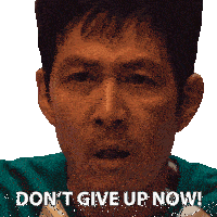 a man says do n't give up now in front of his face