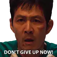 a man says do n't give up now in front of his face