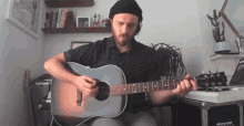 playing the guitar james vincent mcmorrow guitarist musician feeling it