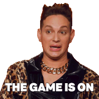a man wearing a leopard print jacket and a gold chain necklace says the game is on
