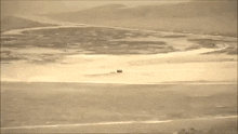a large explosion in the middle of the desert