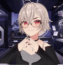 a screenshot of a girl with glasses and a cross on her neck shows a battery level of 53%