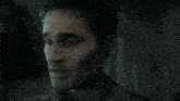 a close up of a man 's face in a video game with the number 13 on his neck