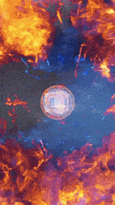a circular object in the middle of a colorful fire
