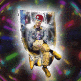 a man wearing a hat with the letter o on it is sitting in a chair