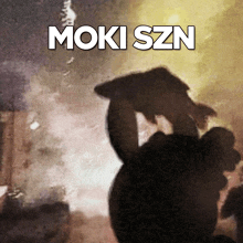a silhouette of a person with the name moki szn written above them