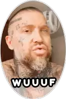 a man with a beard and tattoos on his face is making a funny face and says wuuuuf