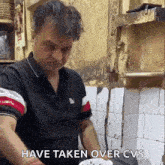 a man is cooking in a kitchen with the words have taken over cvs on the bottom