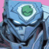 a close up of a robot 's face with a green smiley face on it