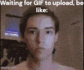 a man is waiting for a gif to be uploaded