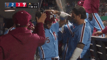 a baseball game is being played between the phillies and the yankees