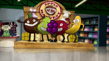 a group of cartoon fruits standing in front of an apple of the harvest sign