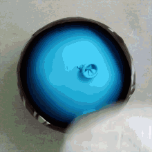 a blue balloon with a hole in it
