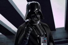 darth vader is giving a thumbs up in front of a striped background