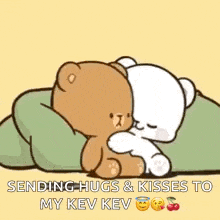 two teddy bears are hugging each other and sending hugs and kisses to my key kev .