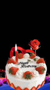 a birthday cake with strawberries and a candle that says happy birthday on it