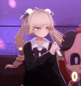 a girl with pigtails is holding a microphone in front of a stuffed animal