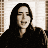 Rudy Pankow Lily Collins GIF