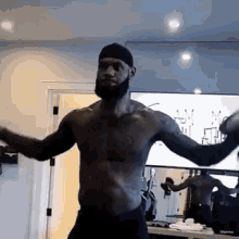 lebron james working out workout flexing muscles