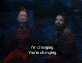 a man and a woman are standing next to each other and the man says it keeps fading