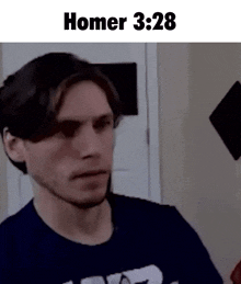 a man in a blue shirt is standing in front of a door and a sign that says homer 3:28