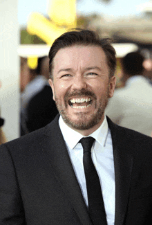 Ricky Gervais Laughs GIF