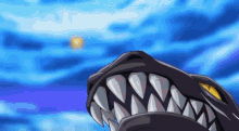 a close up of a shark 's mouth with sharp teeth against a blue background .