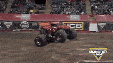 a monster jam advertisement with a monster truck jumping