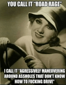 a black and white photo of a woman holding a steering wheel with the caption you call it road rage