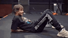 Louis Tomlinson Laying On Floor GIF - Louis Tomlinson Laying On Floor Sitting On Floor GIFs