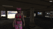 a woman with pink hair is standing in a parking garage in a video game called grand theft auto v