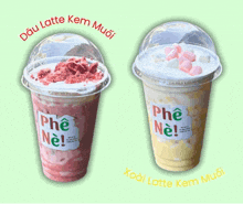 two cups of iced drinks with the words phe ne written on them