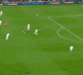 a soccer game is being played in front of a banner that says copa rey