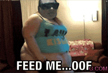 a fat man wearing sunglasses and a blue tank top says feed me oof.com
