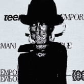 a black and white photo of a man wearing a hat with the word empowering written on it