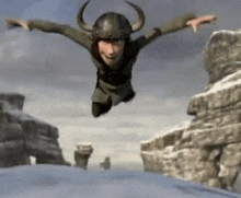 a cartoon character wearing a horned helmet is jumping in the air
