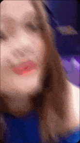 a blurry photo of a woman with red lips