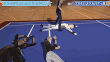 a person laying on a blue court with a sign that says " natural "