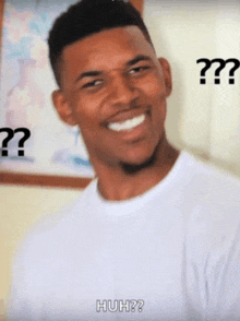a man in a white shirt is making a funny face with the words huh on the bottom