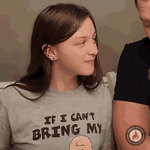 a girl is wearing a shirt that says if i can t bring my