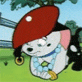 a cartoon dog wearing a red hat and a necklace is sitting in the grass .