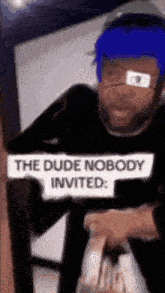 a man wearing a blue eye patch and a black shirt that says the dude nobody invited .