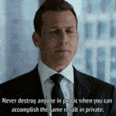 a man in a suit and tie says never destroy anyone in public when you can