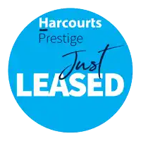 a blue circle with the words harcourts prestige just leased