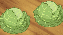 a couple of ponies standing next to each other with vegetables flying around them