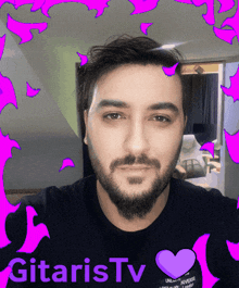 a man with a beard is surrounded by pink flames and the name gitaristv