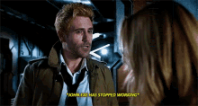 a man in a trench coat and tie is talking to a woman who says john exe has stopped working