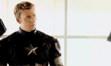 a man in a captain america uniform with a star on it