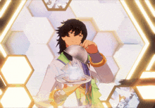 a man is holding a spoon and a plate of food